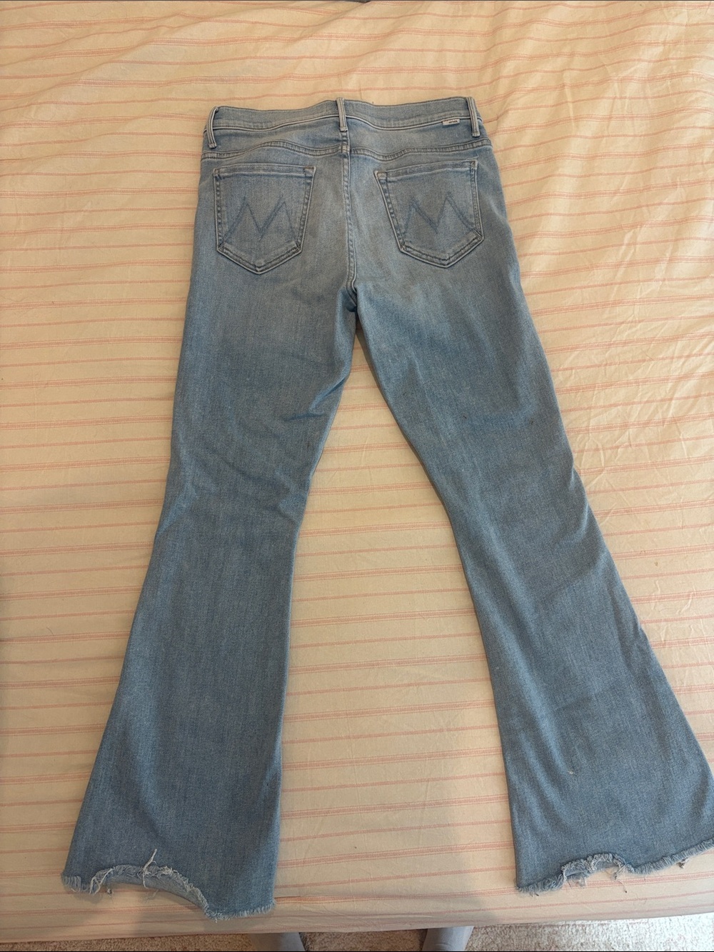 MOTHER Light Blue Flare Jeans with Raw Hem